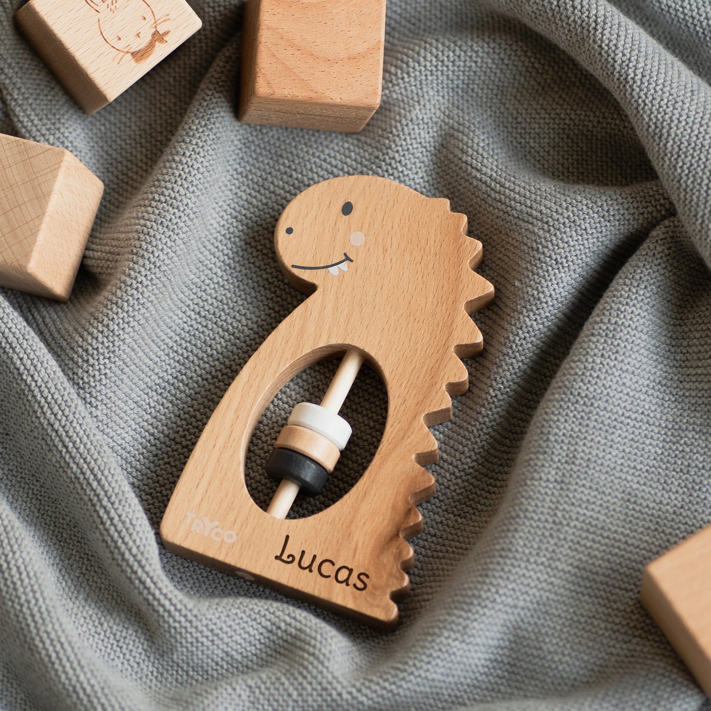 Dino Rassel aus Holz