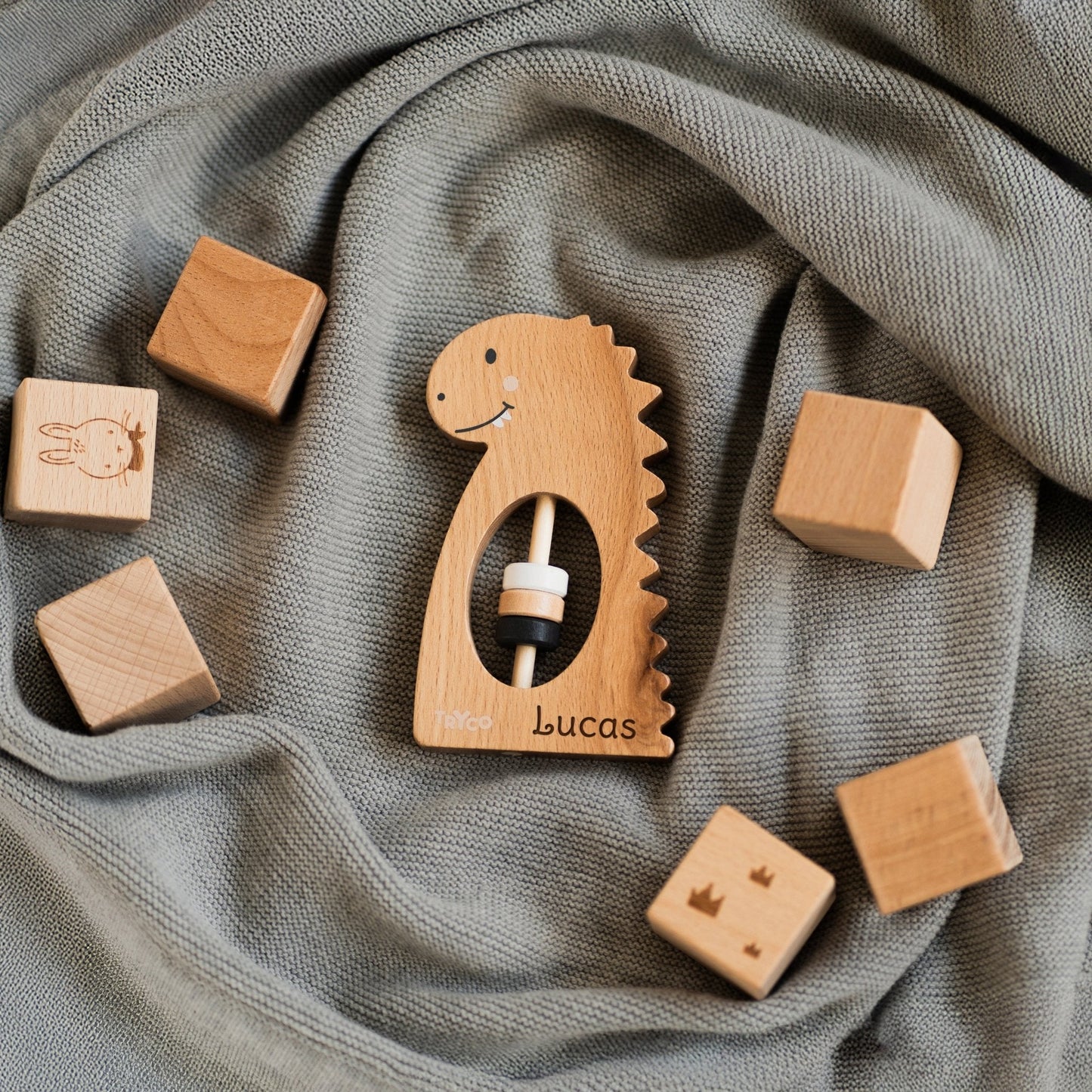 Dino Rassel aus Holz